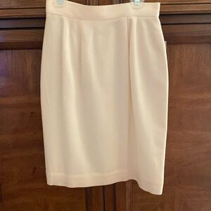 Off white skirt lined.